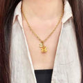 CHANEL Golden Bow CC Charm Necklace