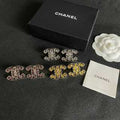 Chanel Elegant Openwork Signature Earrings