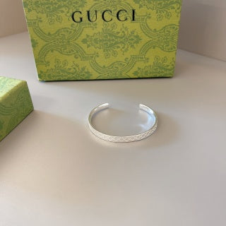 Gucci GG Pattern Engraved Silver Cuff Bracelet