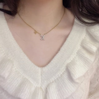 Louis Vuitton Crystal LV Initial Flower Pendant Necklace