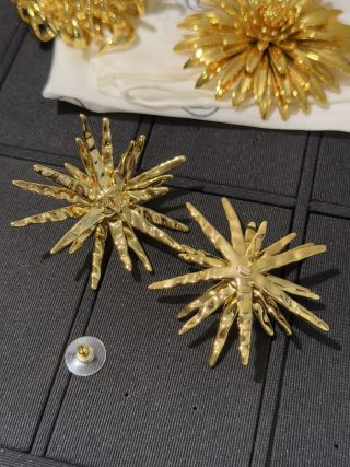 Chanel Gold Sunburst Statement Brooch – Elegant Luxury Fashion Accessory
