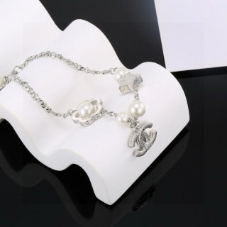 CHANEL Althea Pearl Charm Chain Bracelet
