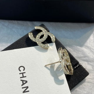 CHANEL Evelisse Silver Signature Stud Earrings