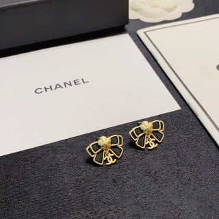 Chanel Camellia black bow stud earrings
