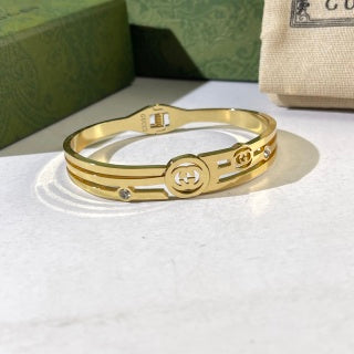 Gucci Interlocking G Round Medallion Double Band Cuff Bracelet