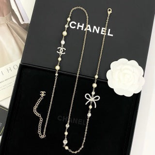 Chanel Elegant Ribbon Pearl Charm Necklace