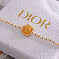 Dior Liora Pearl CD Medallion Charm Bracelet