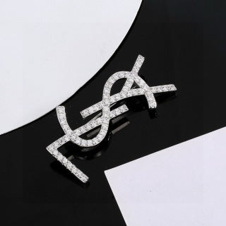 YSL Cassandre Crystal Monogram Brooch