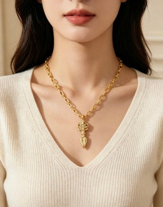 Gucci GG Engraved Spike Drop Gold Pendant Necklace