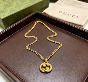 Gucci GG Twisted Rope Medallion Gold Pendant Necklace
