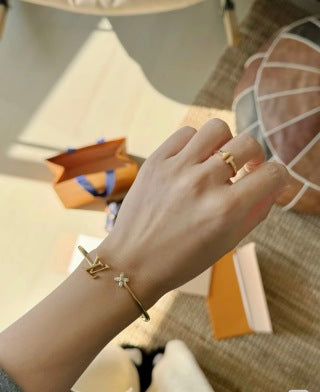 Louis Vuitton Blossom LV Initial Cuff Bracelet